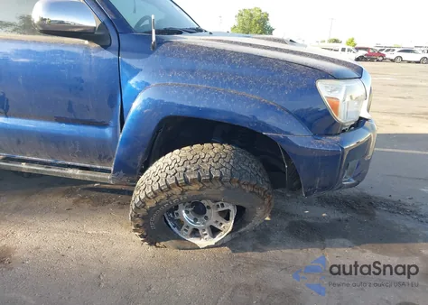 2015 Toyota Tacoma Base V6 z USA, uszkodzony, nr VIN 3TMLU4EN8FM190634